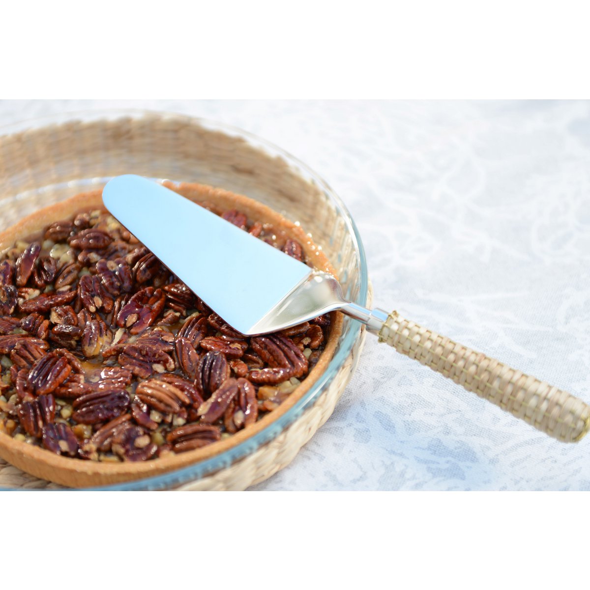 Beige taartschopje met rieten handvat