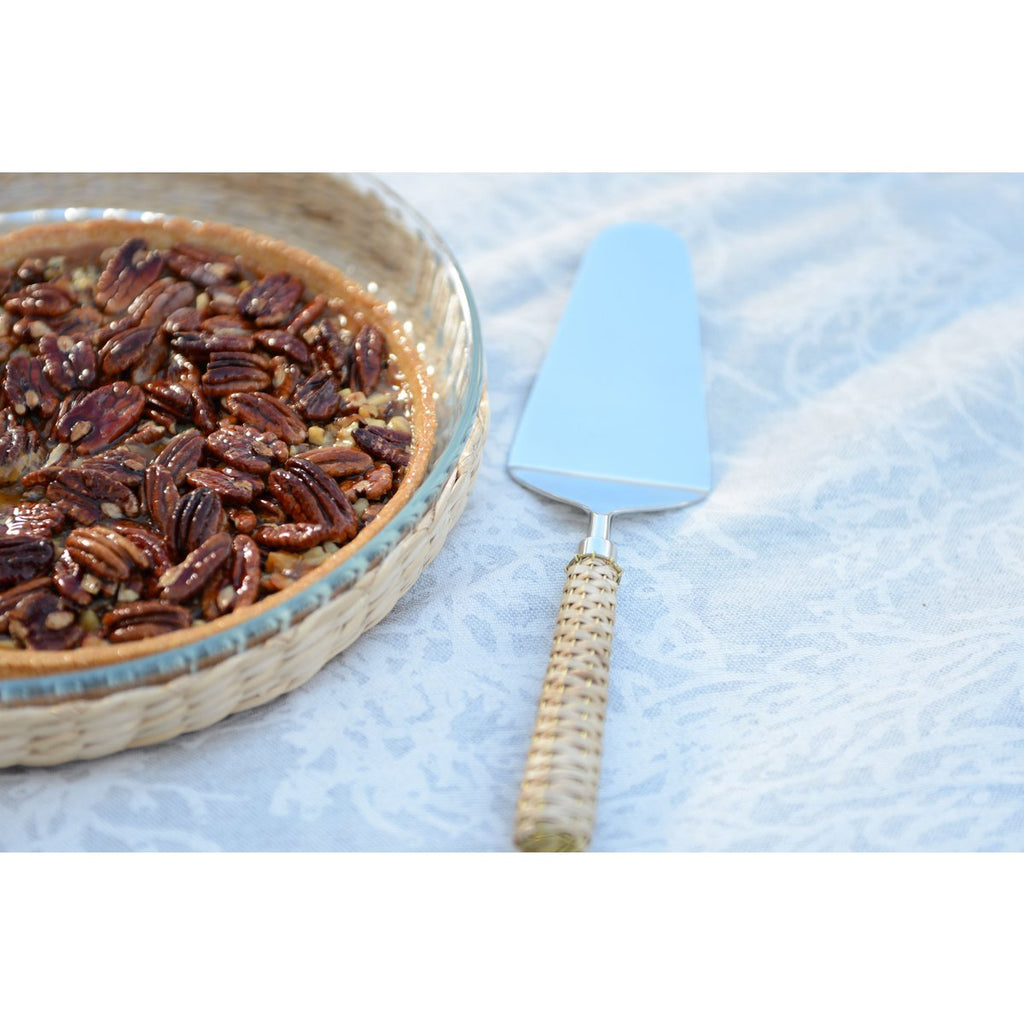 Beige taartschopje met rieten handvat